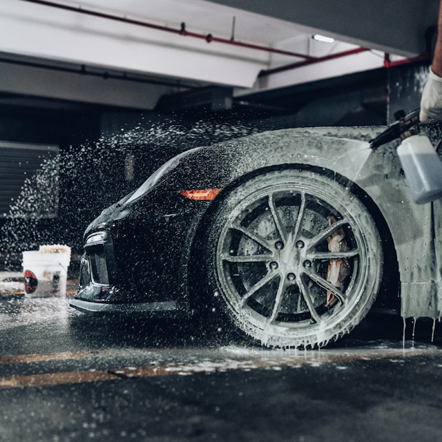 Sports car being professionally washed